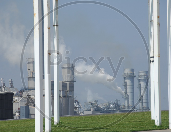 Industrial Exhaust Towers with Thick Smoke