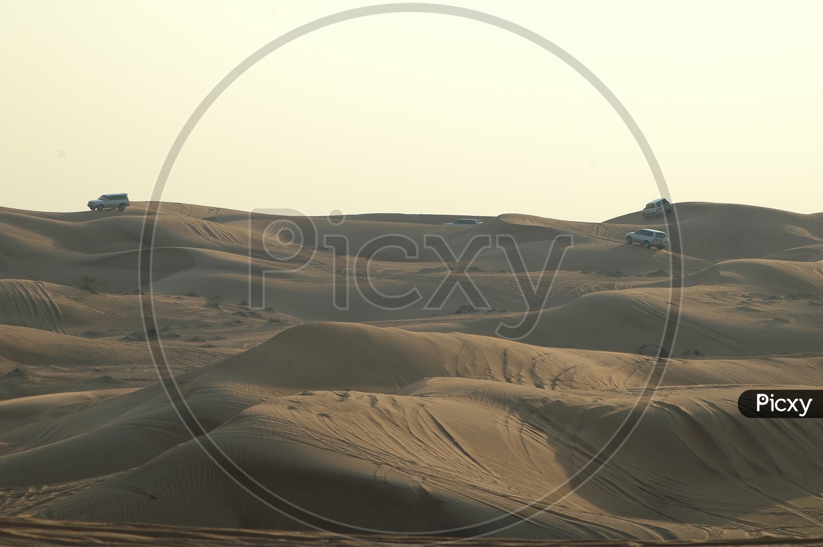 Cars on Sand Dunes of Dubai