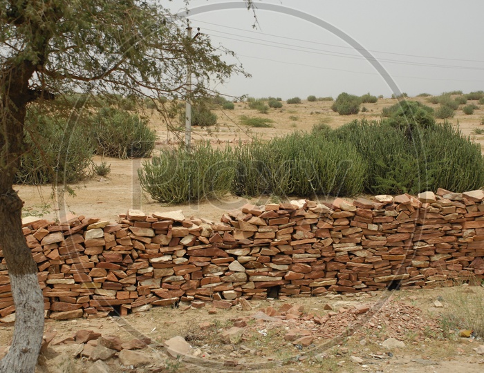 Fencing Walls  Constructed with rocks
