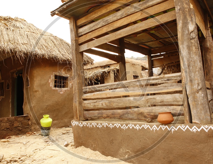 Thatched mud huts in a village