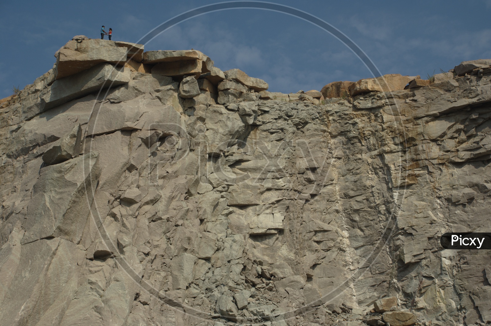 Couple standing on top of the Granite Quarry
