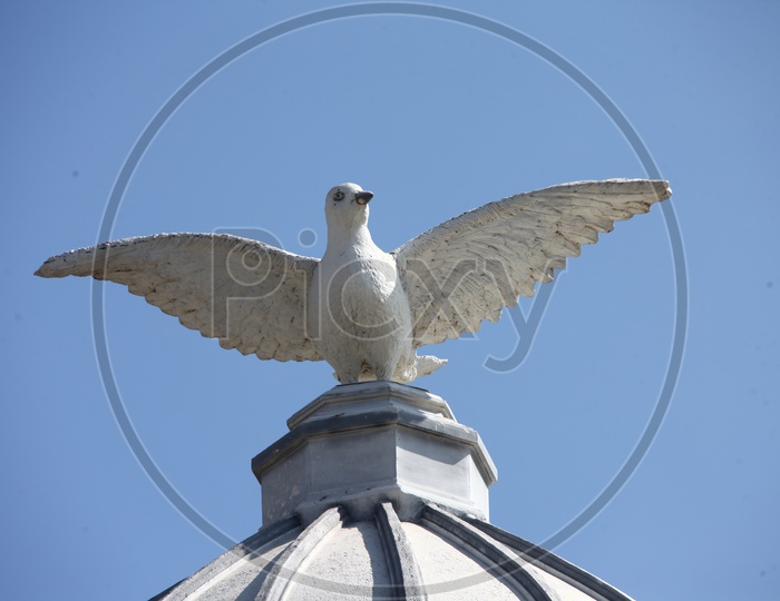 A Dove Statue with its wings widespread
