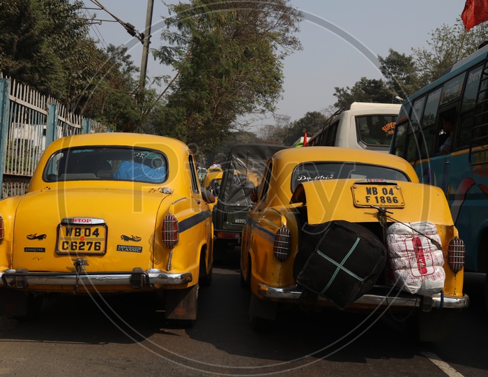 Yellow Taxi On The Roads of Kolkata