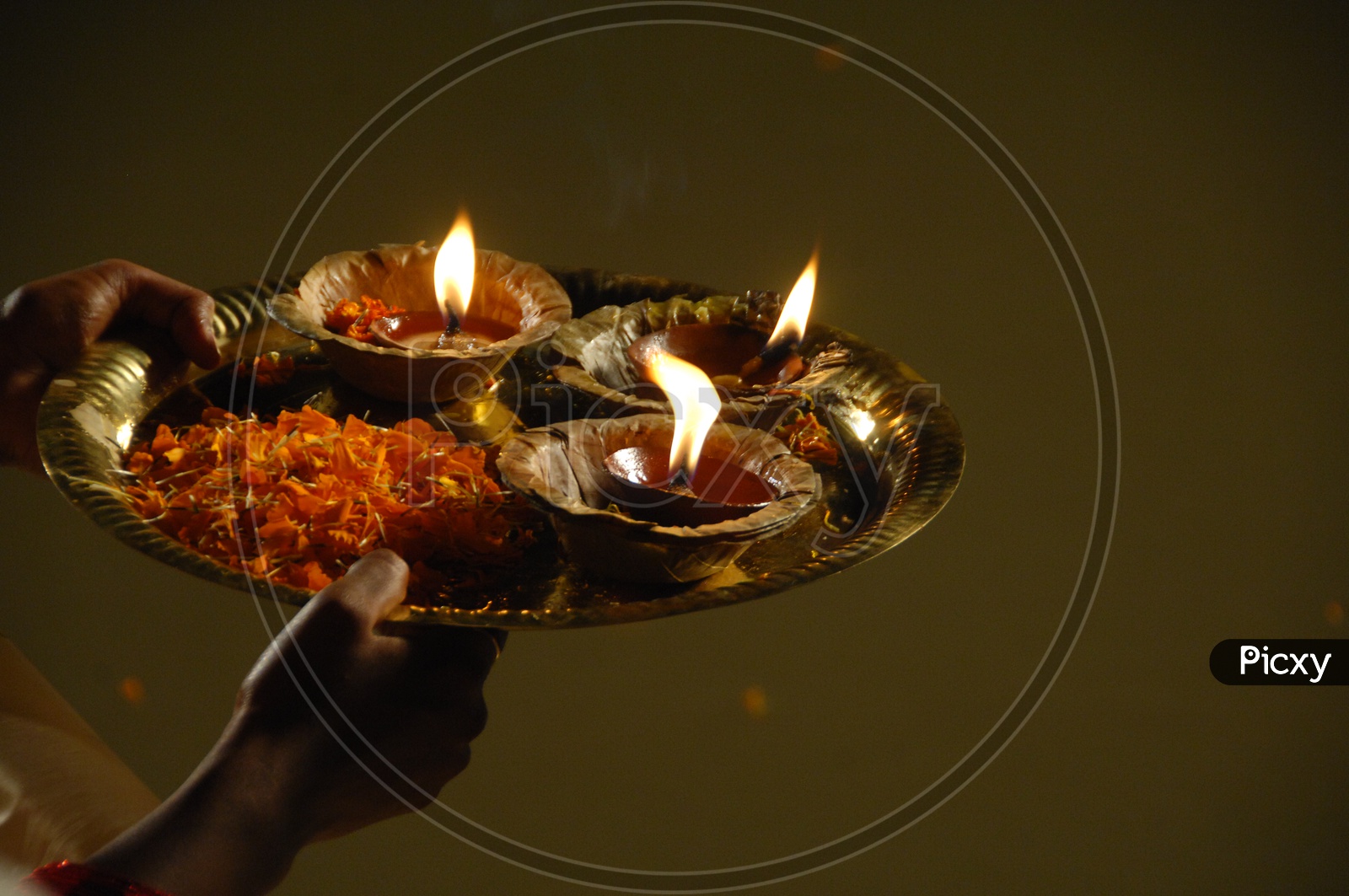 floating Diya - Deepam used for Puja arranged in a plate