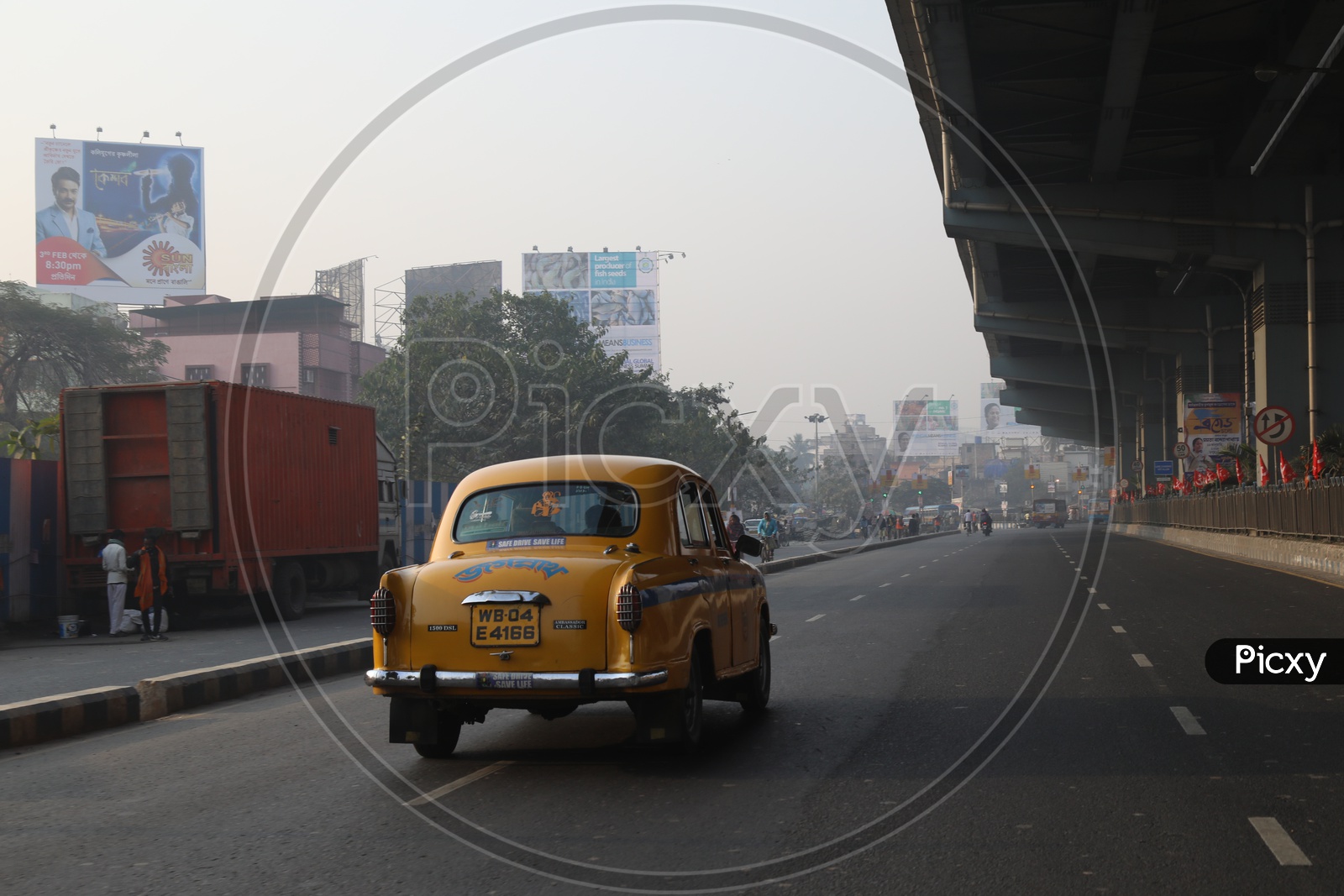 Yellow Colour Taxis on Roads of Kolkata