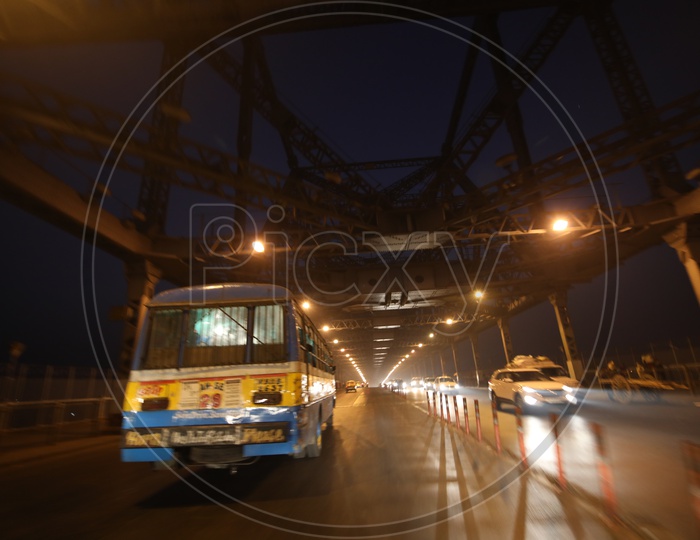 Vehicles Commuting On Howrah Bridge at  Night Time