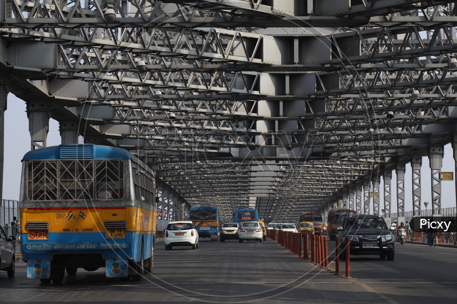 Vehicles Commuting on Howrah Bridge