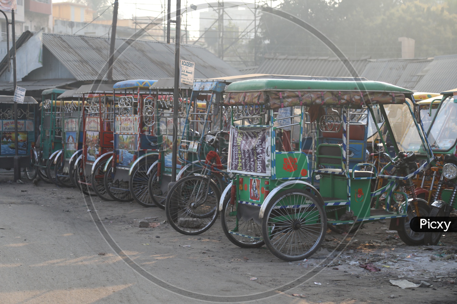 Tricycle Autos in a  Stand