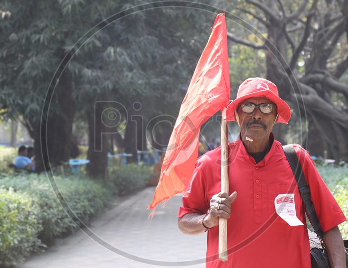 A CPI Activist On red Clothes