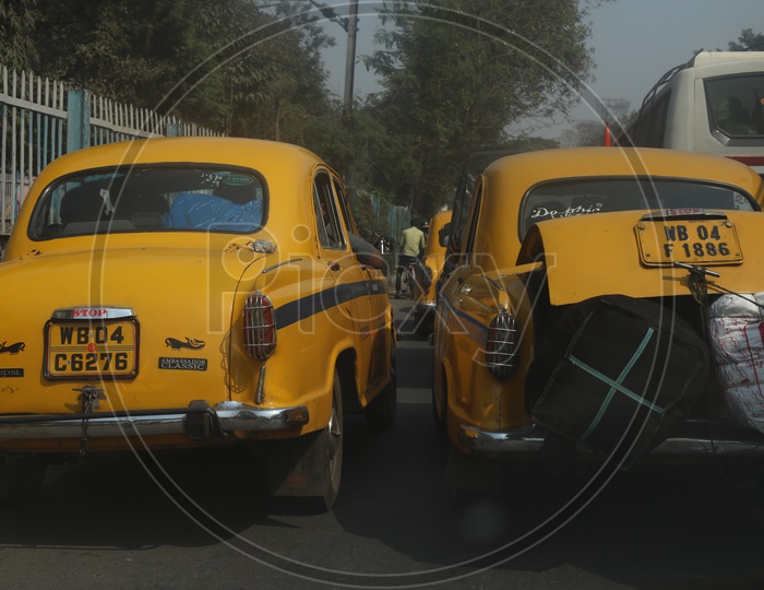 Yellow Color Taxis on Roads Of Kolkata