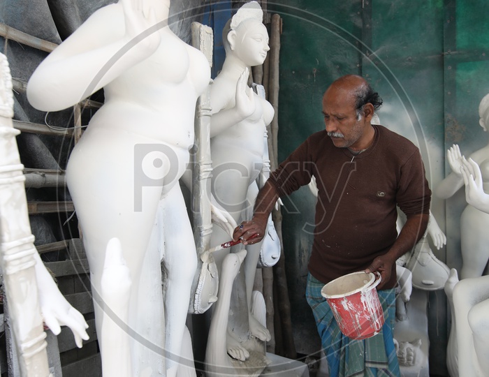 A Sculptor Making Hindu Goddess Durga Clay Idols