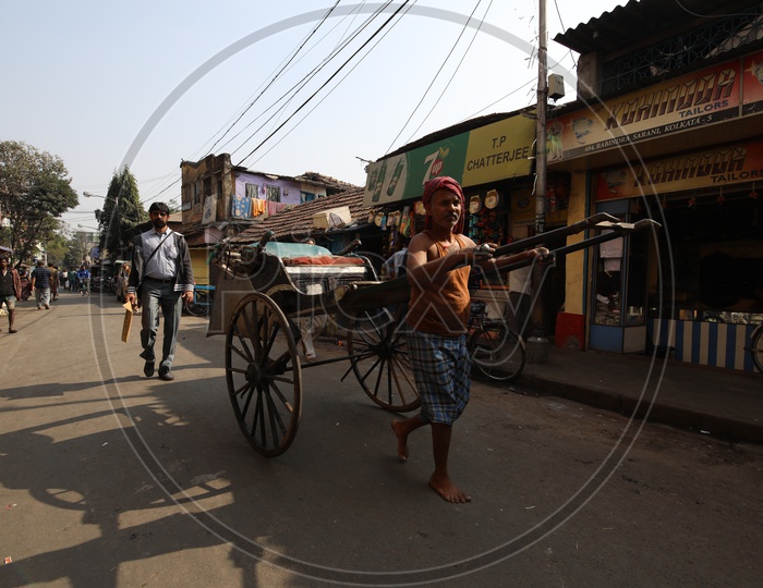 Hand-Pulled Rickshaw In Kolkata