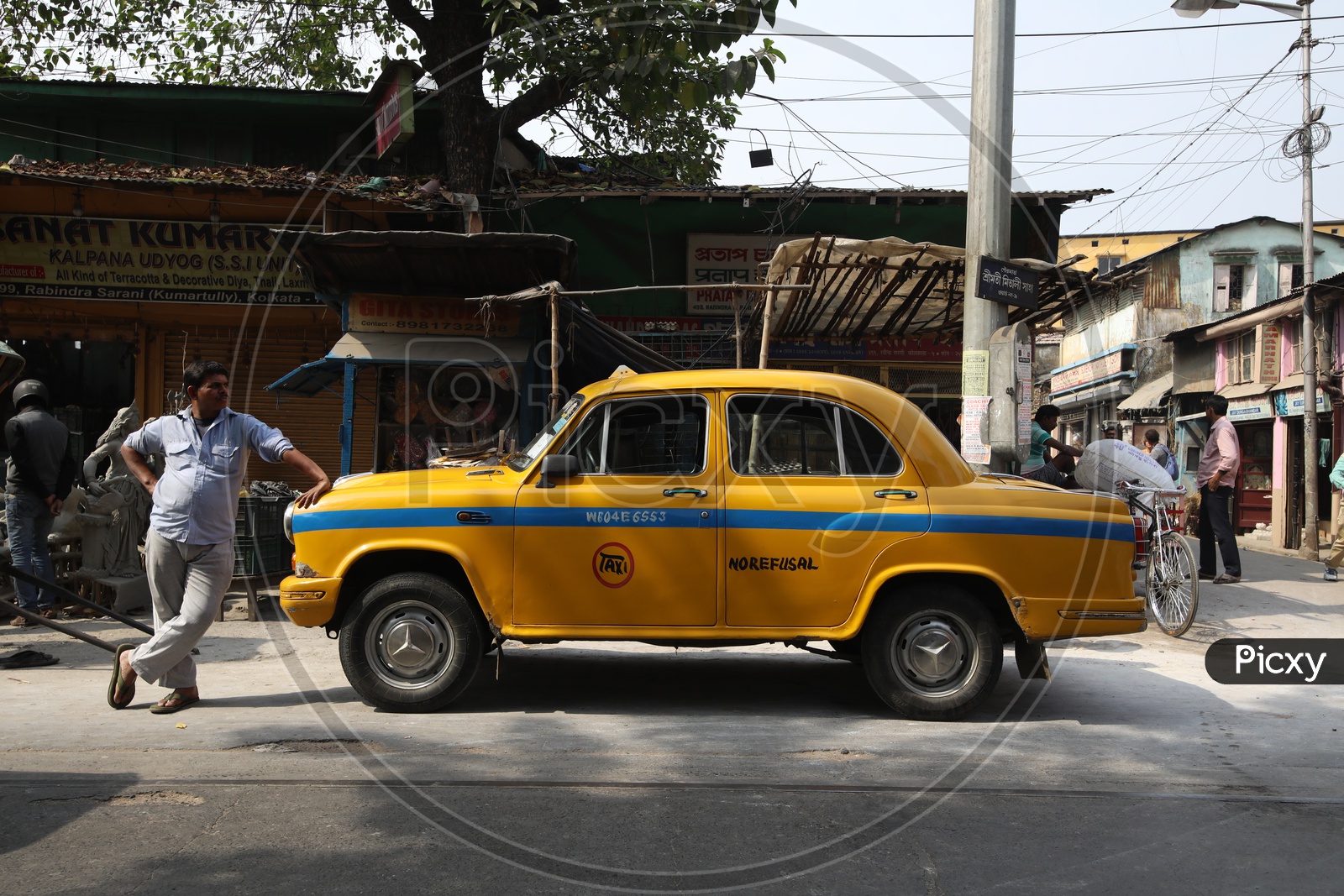 Yellow Colour Taxis On Kolkata Streets