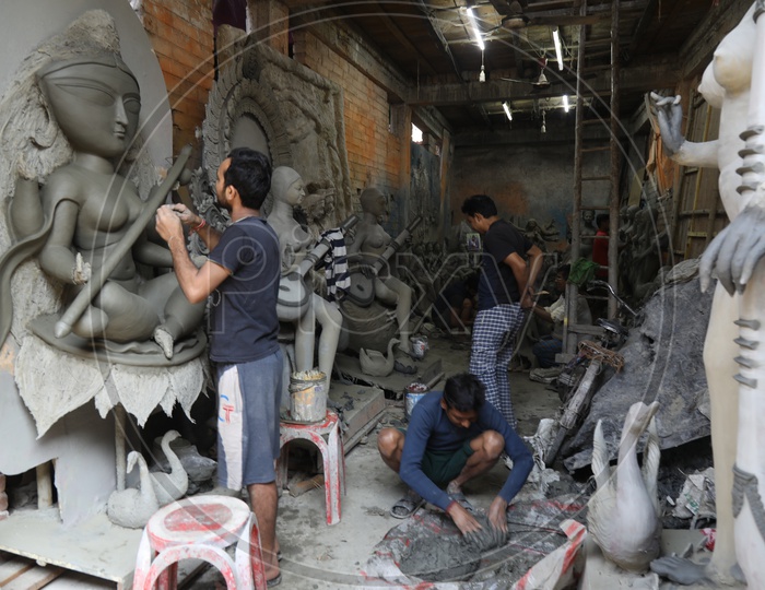 A Sculptor in Making Of Hindu Goddess Clay Idols