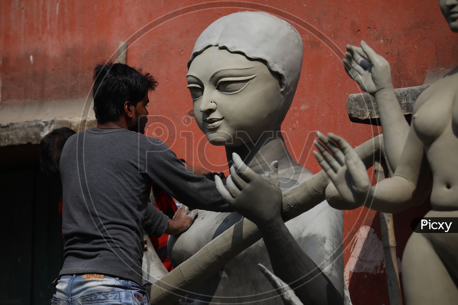 A Sculptor Making The Clay Idols Of Goddess Durga