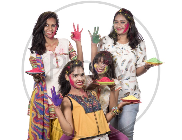 Indian young Girls Celebrating Holi