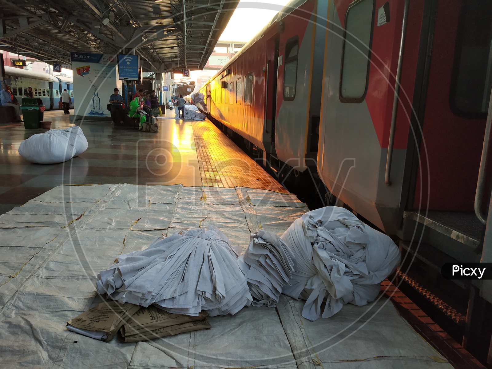 Image of Hospitality Services In Indian Railways Collecting the Bed