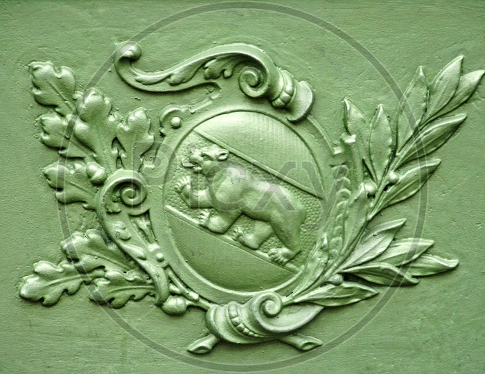 Sculptures of emblems On Walls