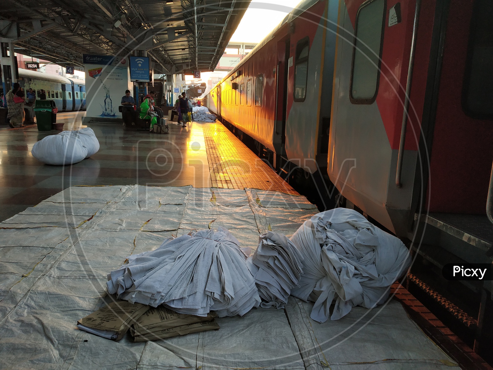 Hospitality Services In Indian Railways Collecting the Bed Sheets From Train