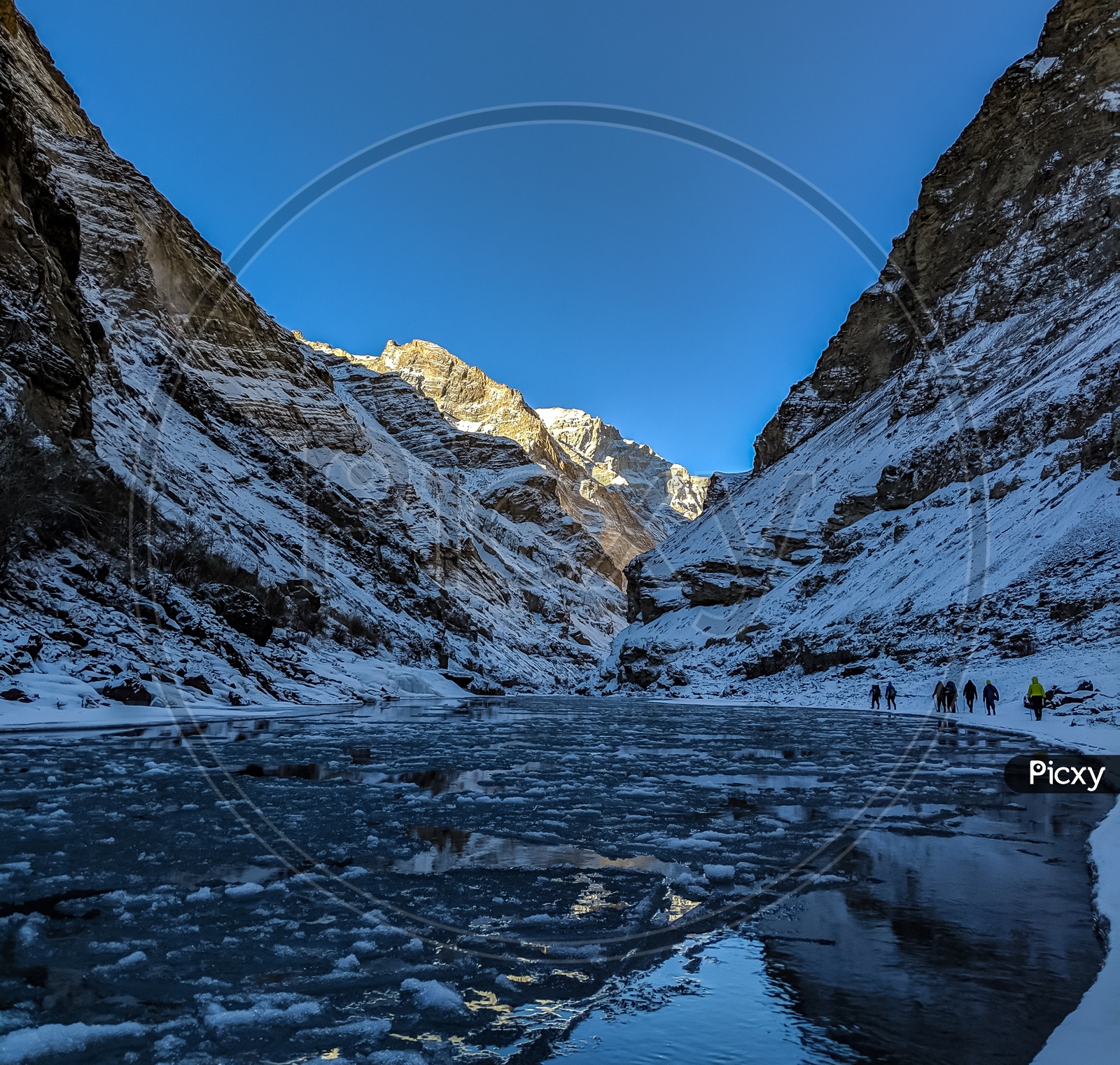 Adventurers  Or Men Walking On The Frozen Ice of River Zanskar  Valley