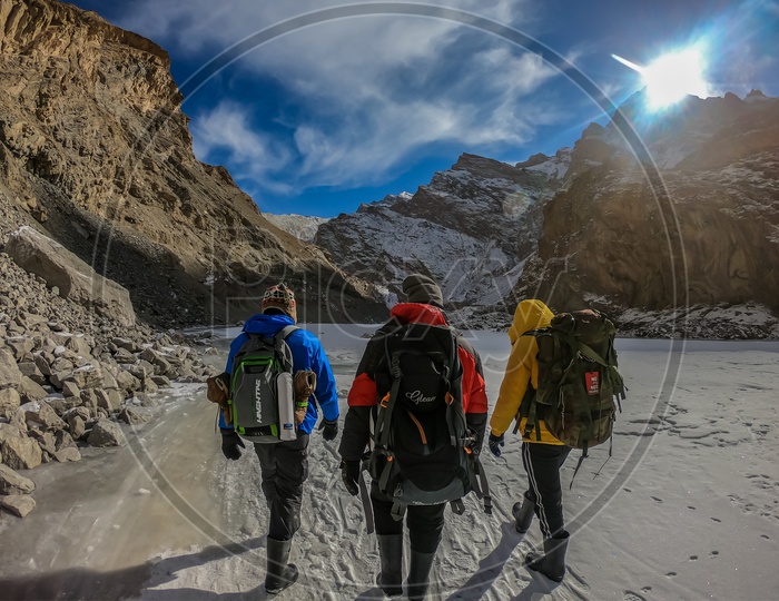 Silhouette of an Adventurers  Or Men Walking On The Frozen Ice of River Zanskar  Valley