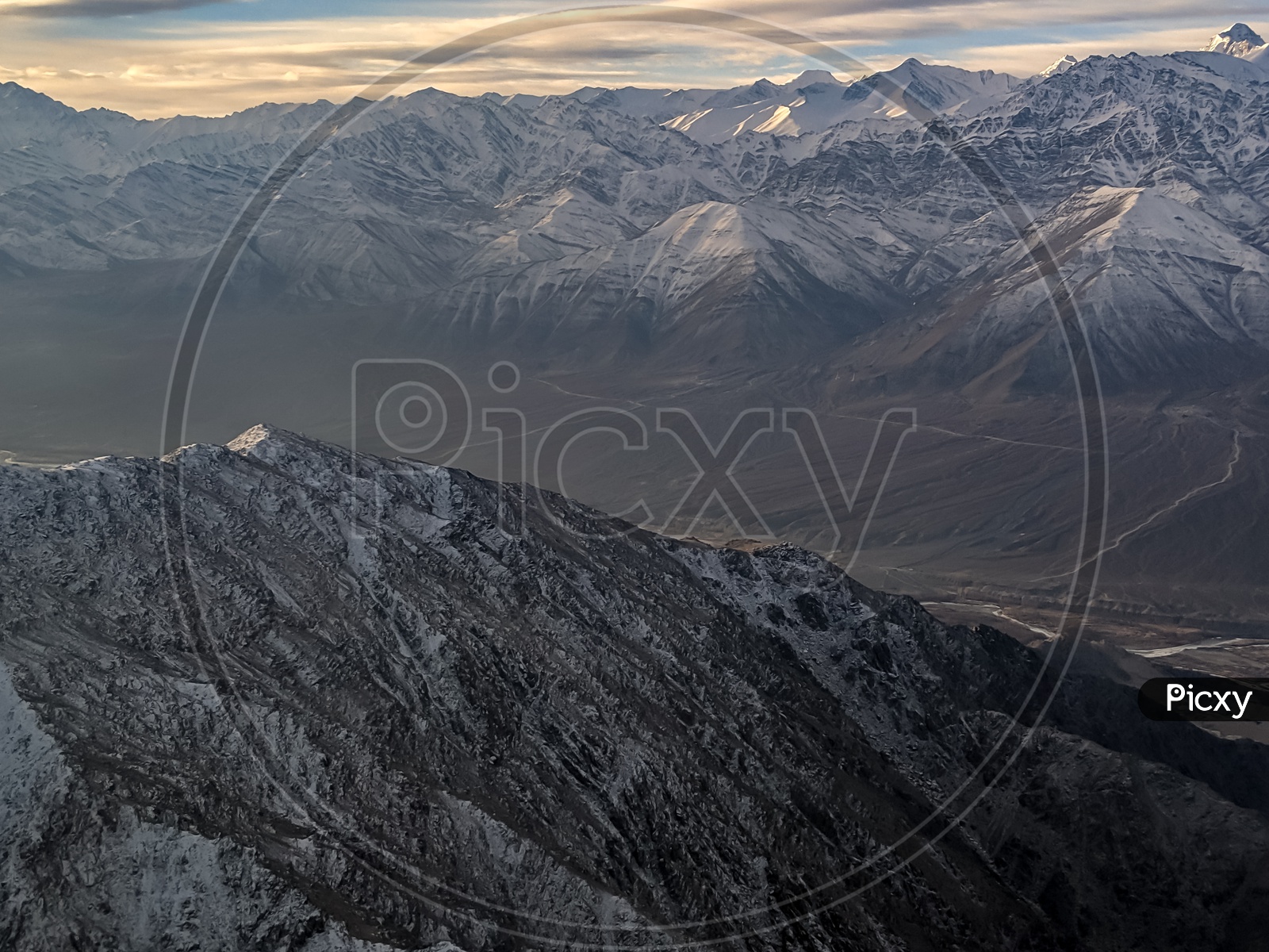 Ice Capped Mountains And Valley Views
