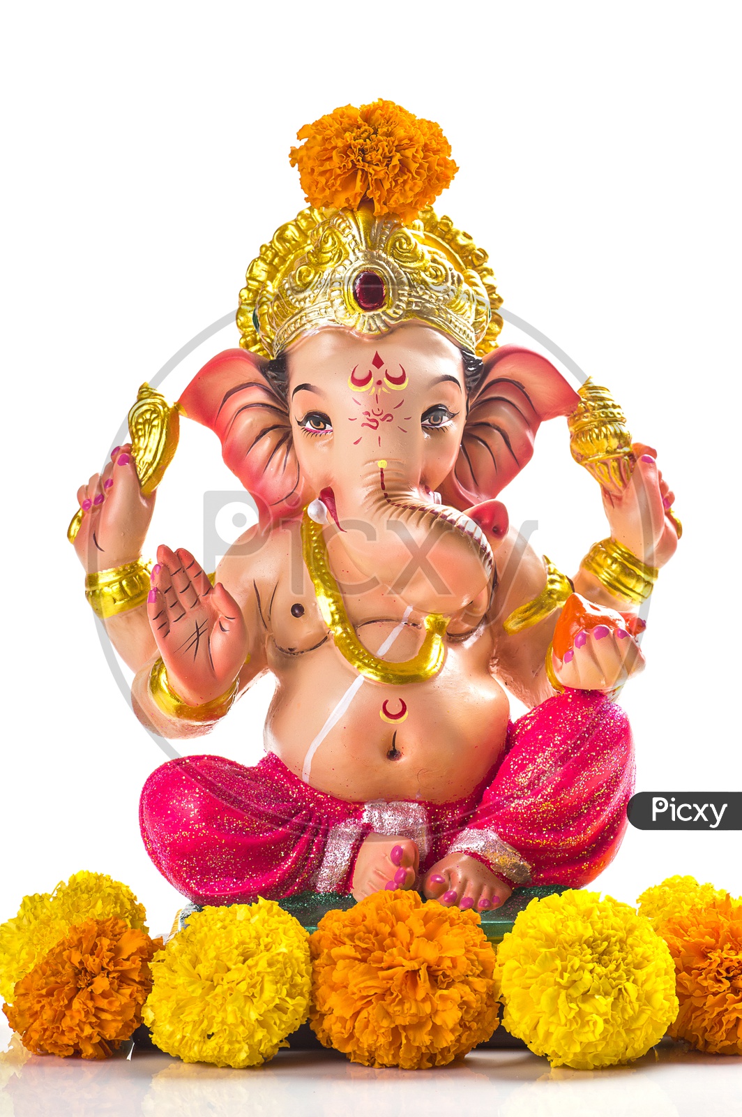 Lord Ganesh Idol with flowers on white background