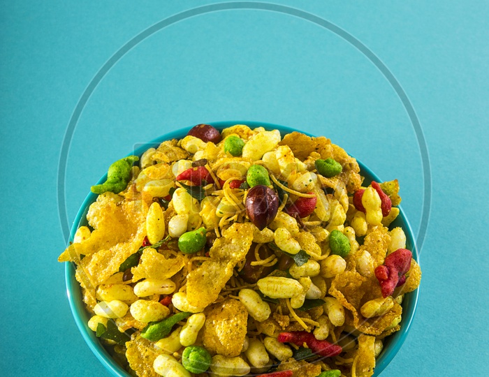 chivda or mixture or farsan made of gram flour in a bowl