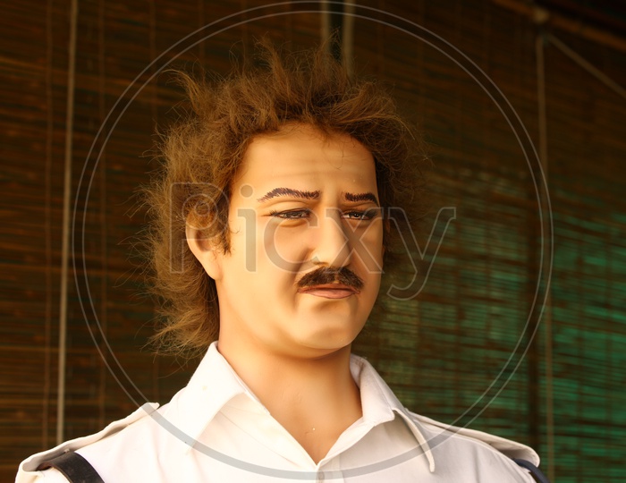 A Male Mannequin with frizzy hair