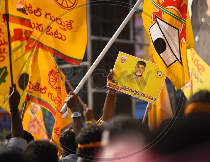 TDP Party workers with Placards and flags in a rally ahead of Andhra Pradesh General Elections 2019
