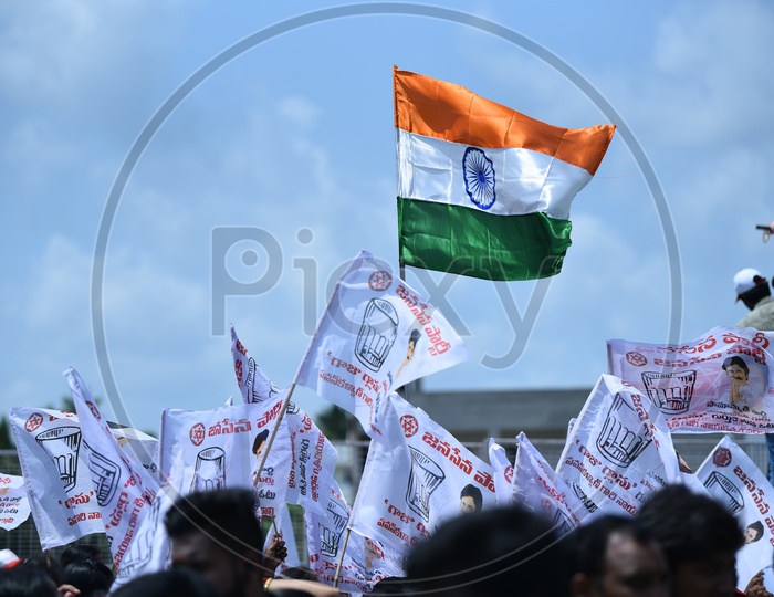 Jana Sena party logo and "Glass tumbler" symbol on flags