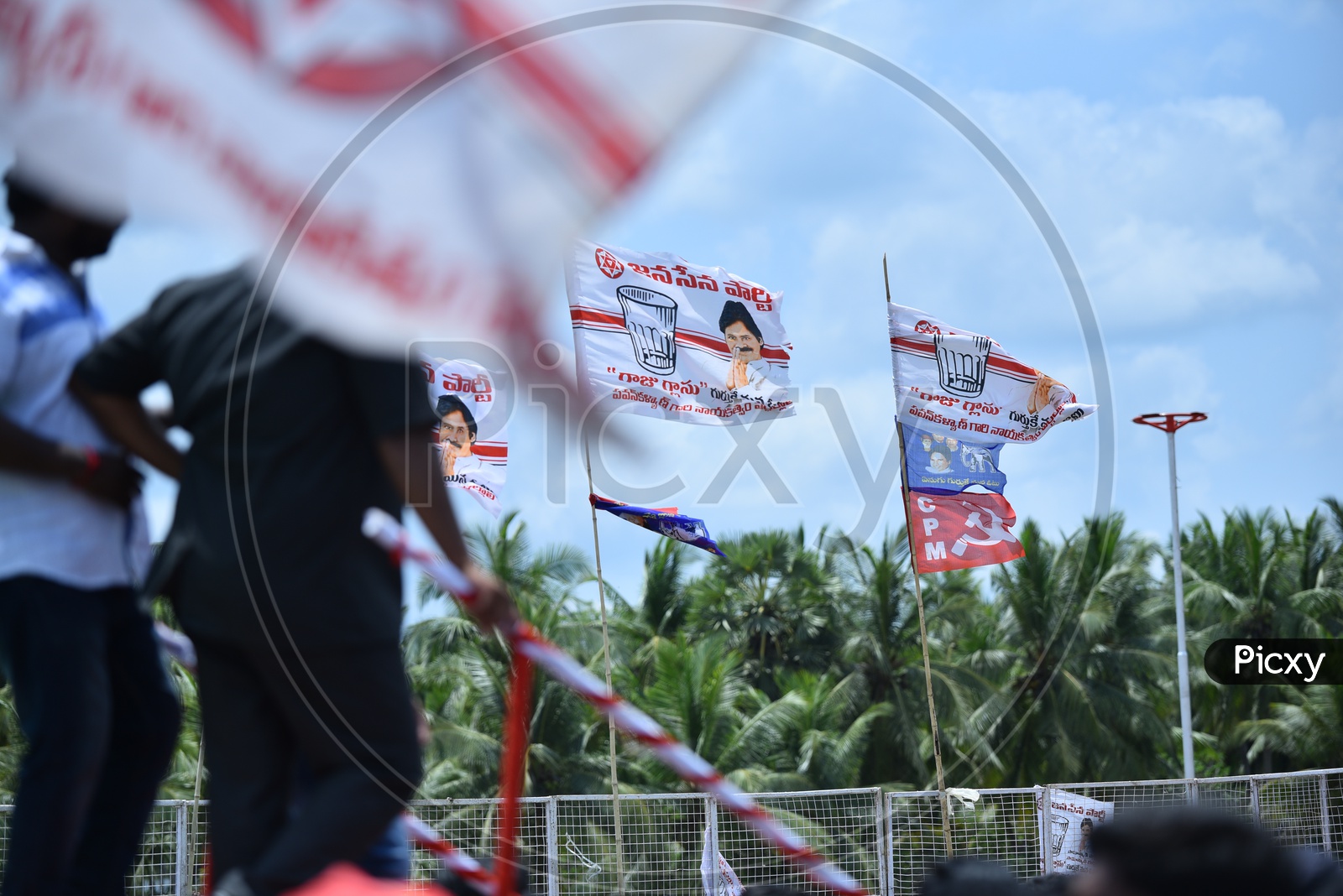 CPM, BSP party flags and Jana sena party flags at an election campaign in Amalapuram