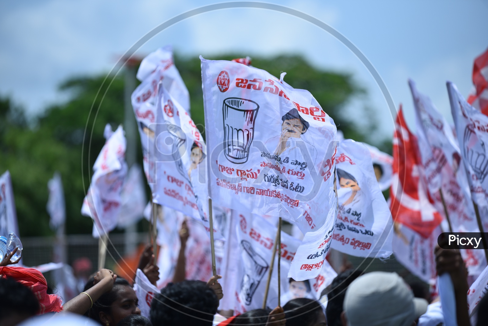 Janasena party symbol 'glass tumbler' on the flags at an election campaign in Amalapuram