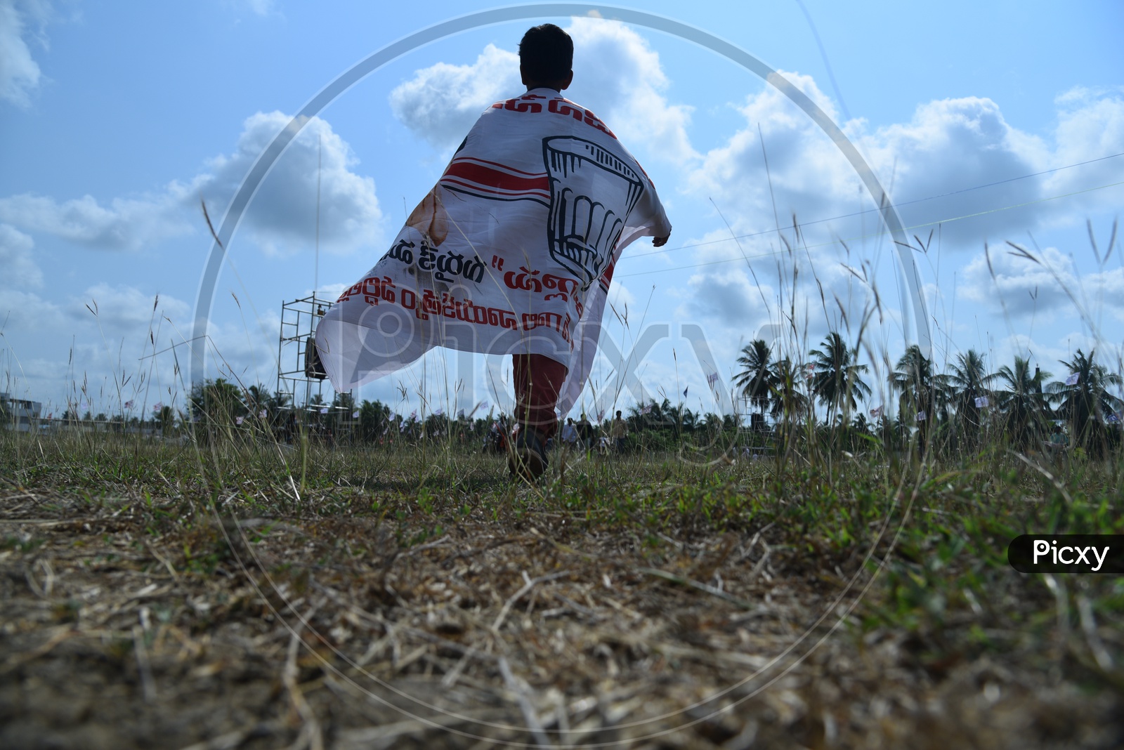 Jana sena party supporter holding party banner