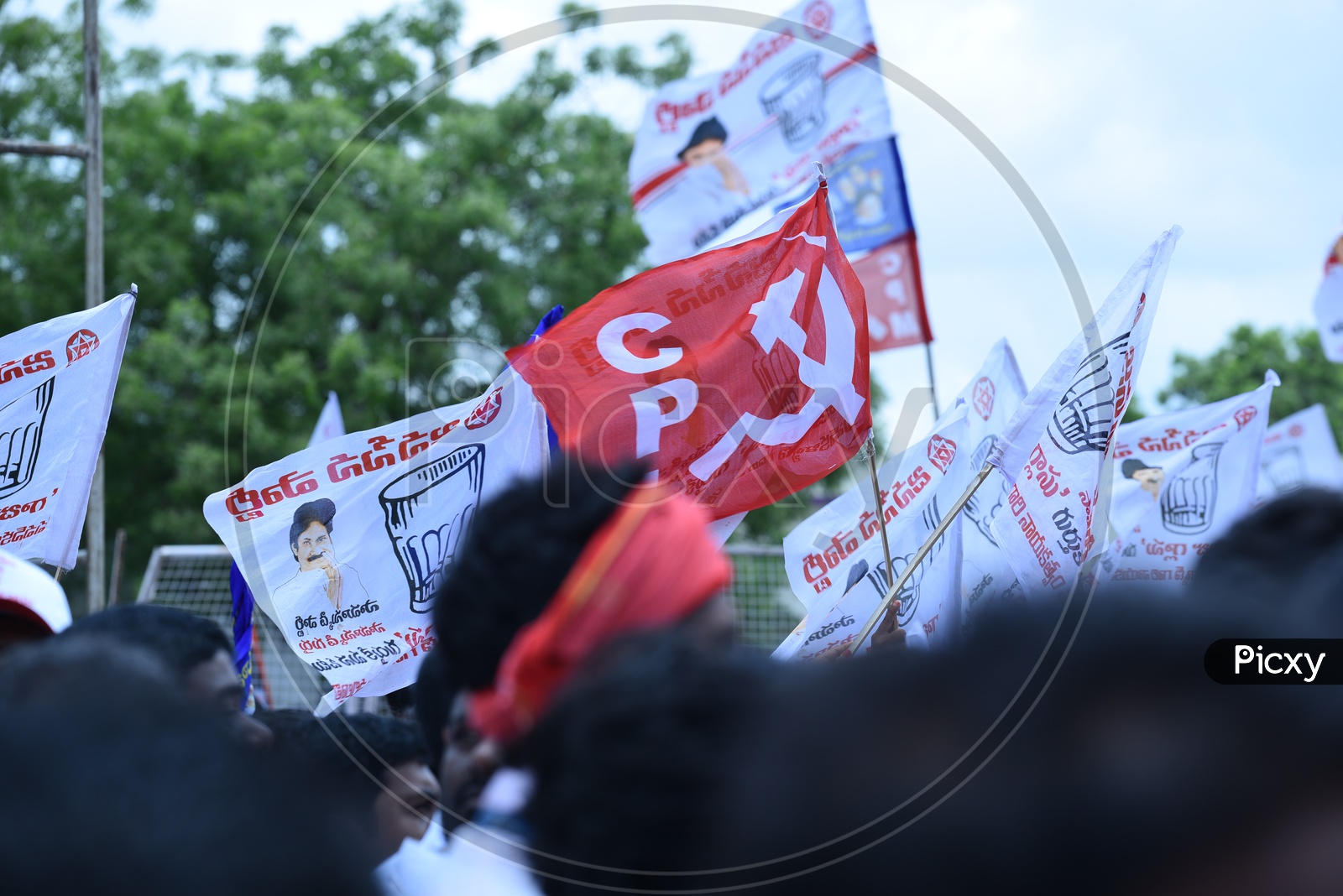 CPI party flag and Jana sena party flags at an election campaign in Amalapuram