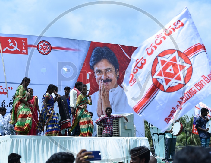 Artists performing folk dance on the stage at Jana sena party election campaign