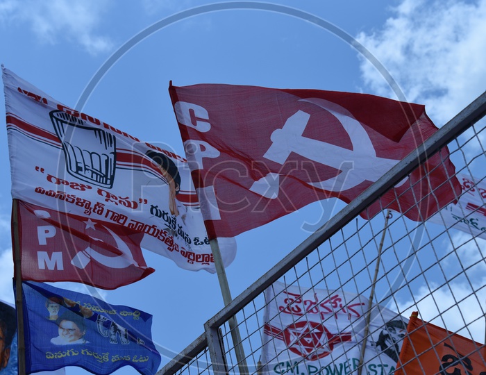 CPI and CPM party flags and Jana sena election symbol 'Glass tumbler' on the flag at an election campaign in Amalapuram