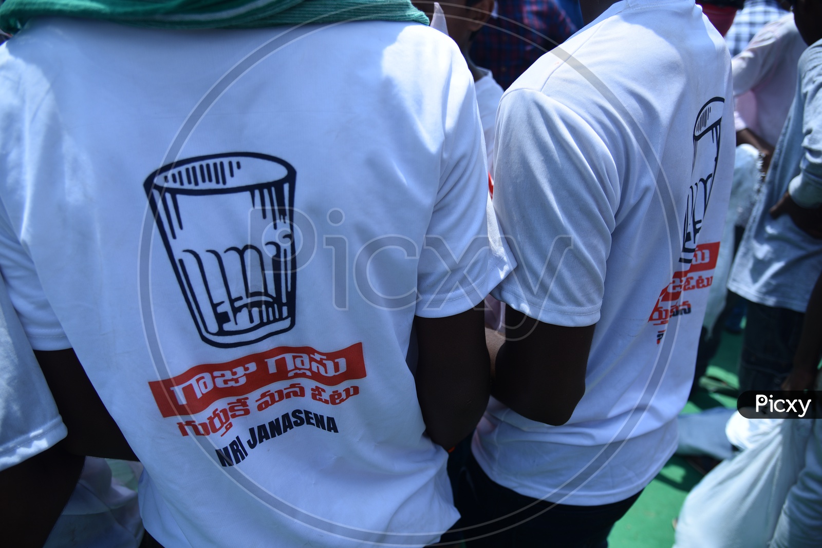 Jana sena party supporters wearing party t-shirts at an election campaign
