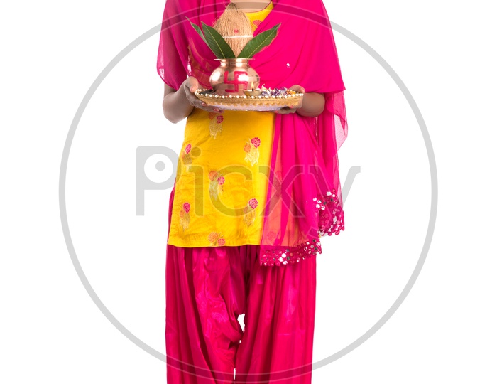 Beautiful Indian Girl Holding Pooja Plate And Kalasham in Hand
