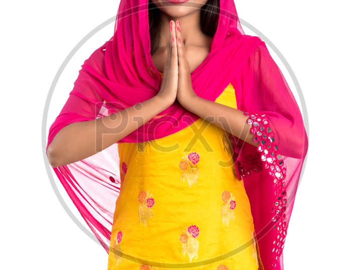 Beautiful Indian Girl With Namaste Gesture And With Smile Face