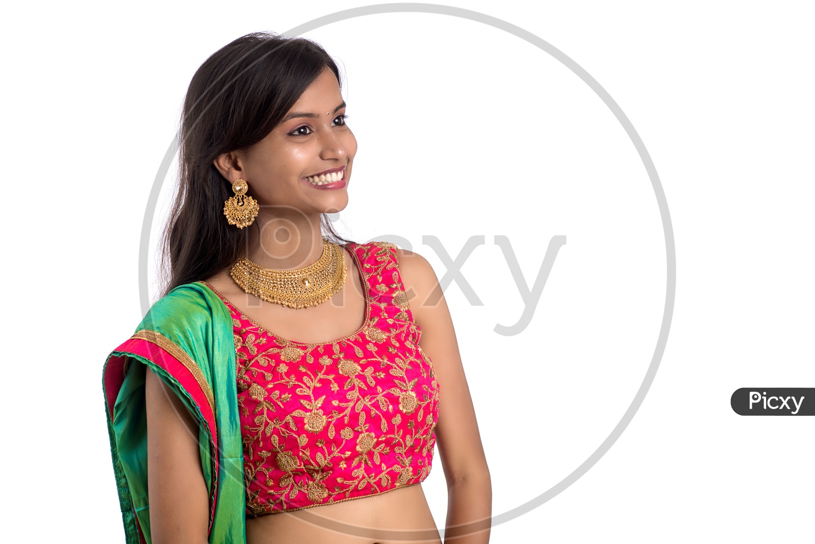 Portrait Of a Young traditional Indian Woman  Smiling  Over a White Background