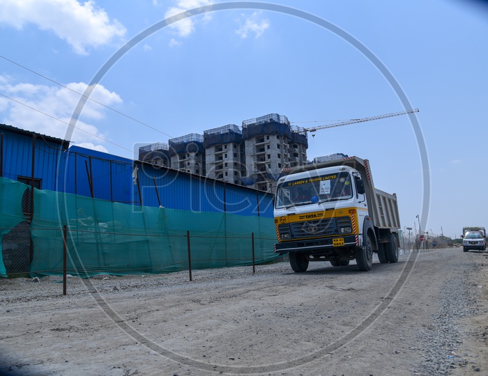 L&T  Construction Company Heavy Lorries at Construction Sites