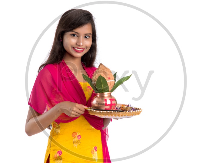 Beautiful Indian Girl Holding Pooja Plate And Kalasham in Hand