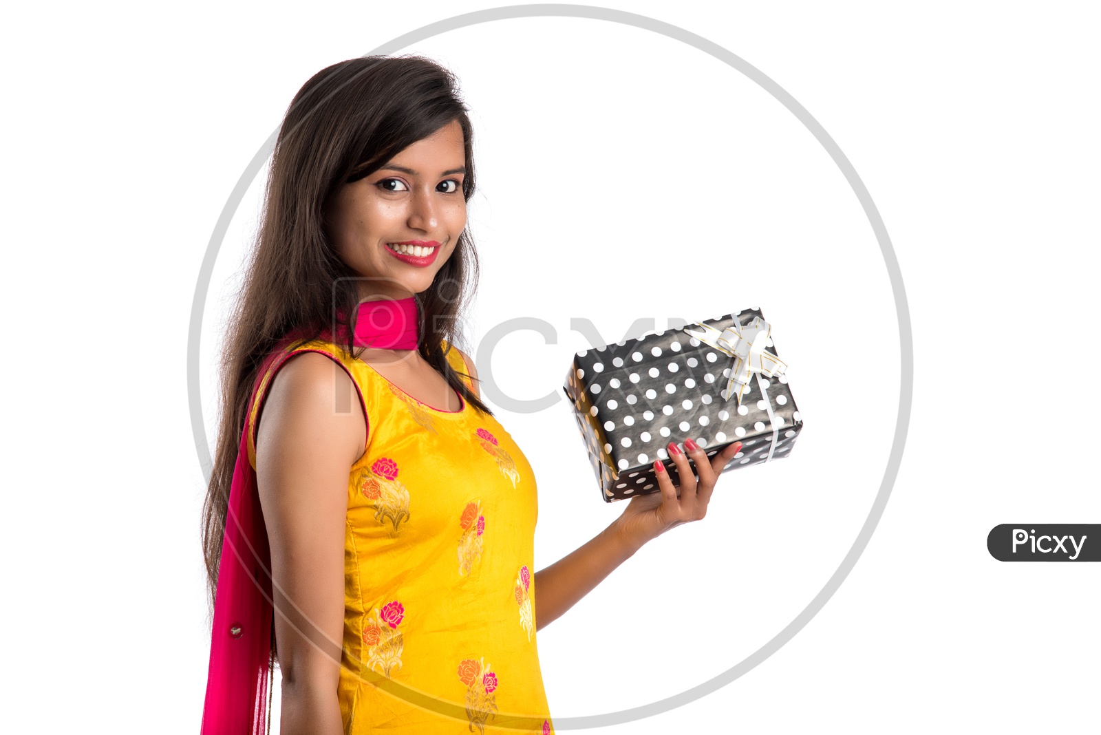 Beautiful Indian Girl Holding Gift Boxes In hand with a  Smile Face