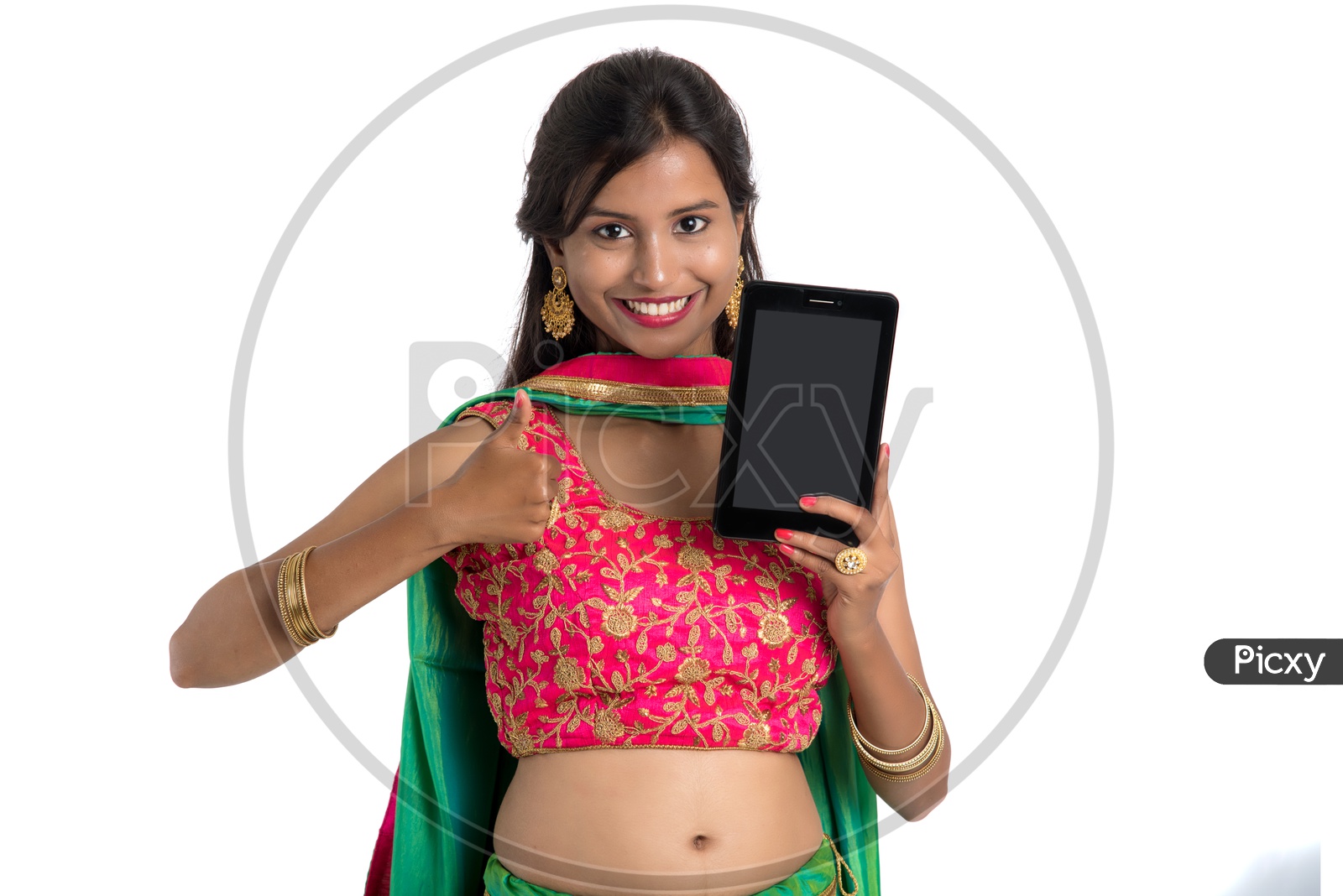 Beautiful Traditional Indian Girl Showing Smart Phone Screen with a Smile on Her Face