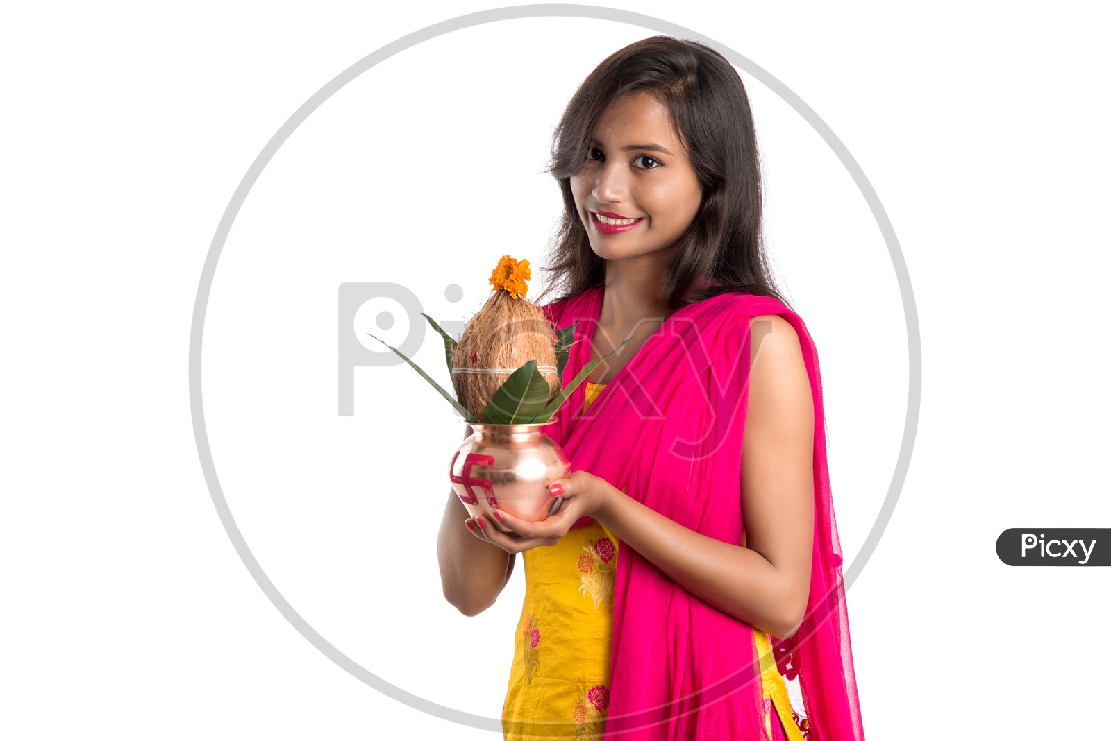 Indian Girl Holding a Traditional Copper Kalash  in hand