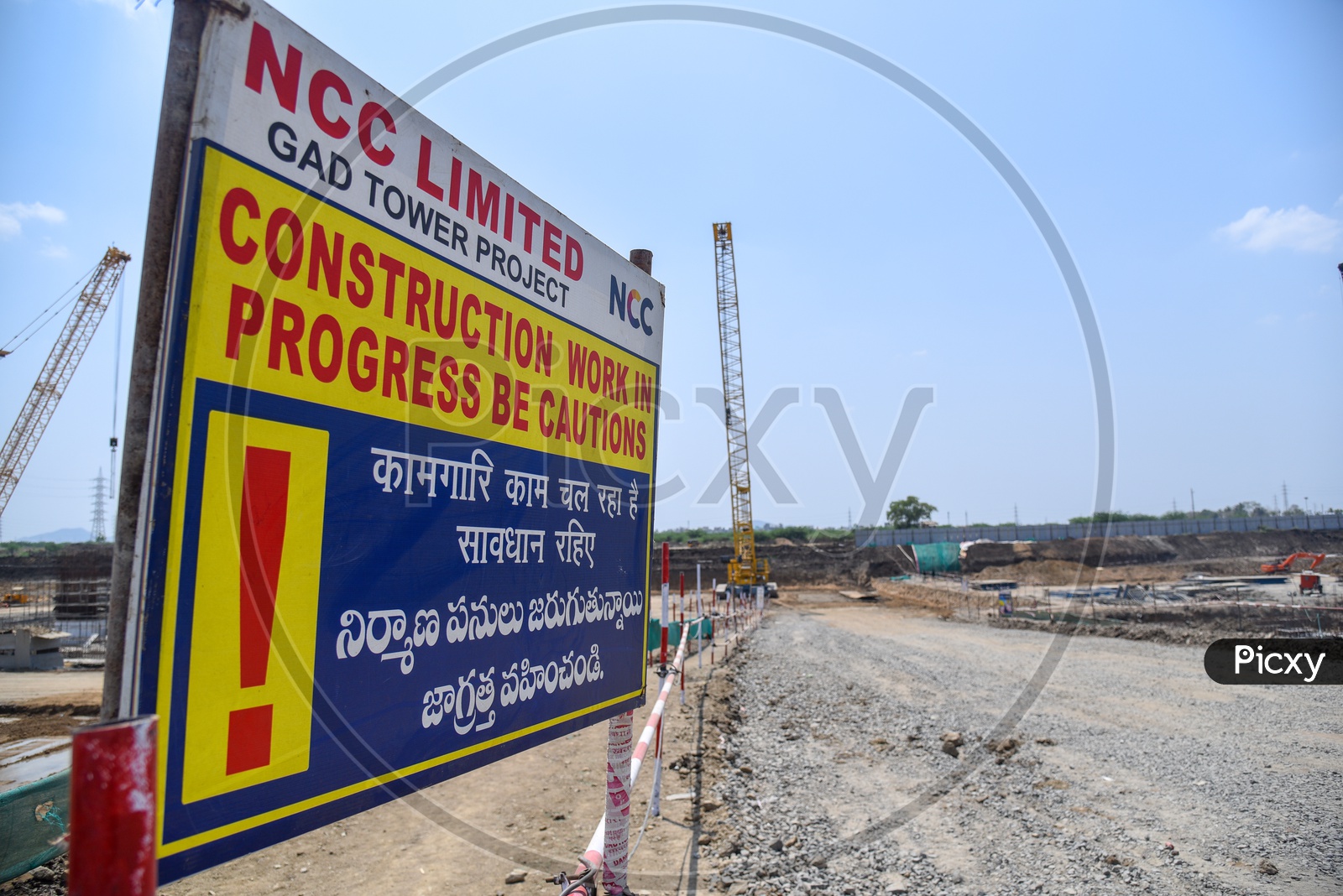 Caution Boards by Construction Company At Working Sites