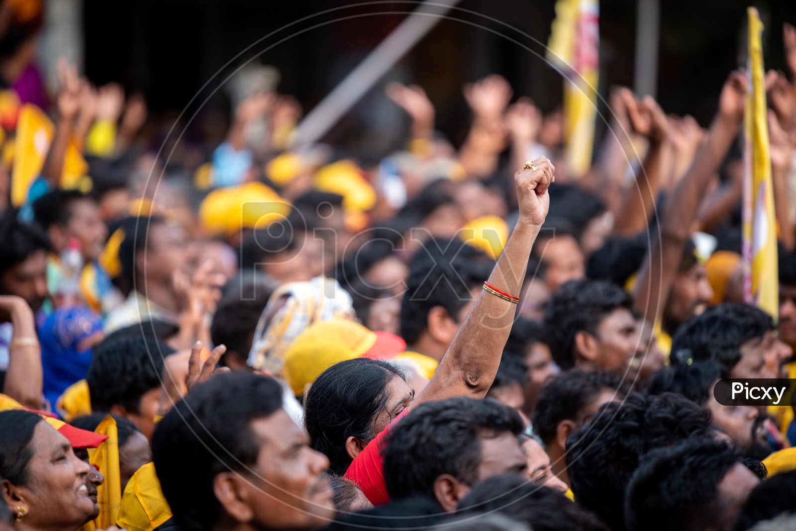 Woman Supporters Rise Hands As a Support For TDP Party During Election Campaign