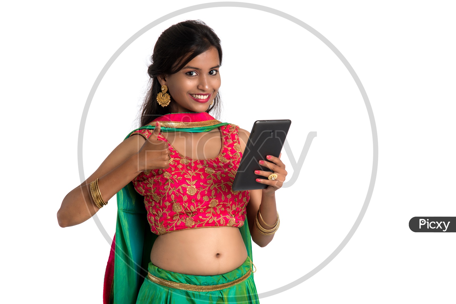 Indian Young Traditional Woman  looking at Smart Phone Screen With an Expression