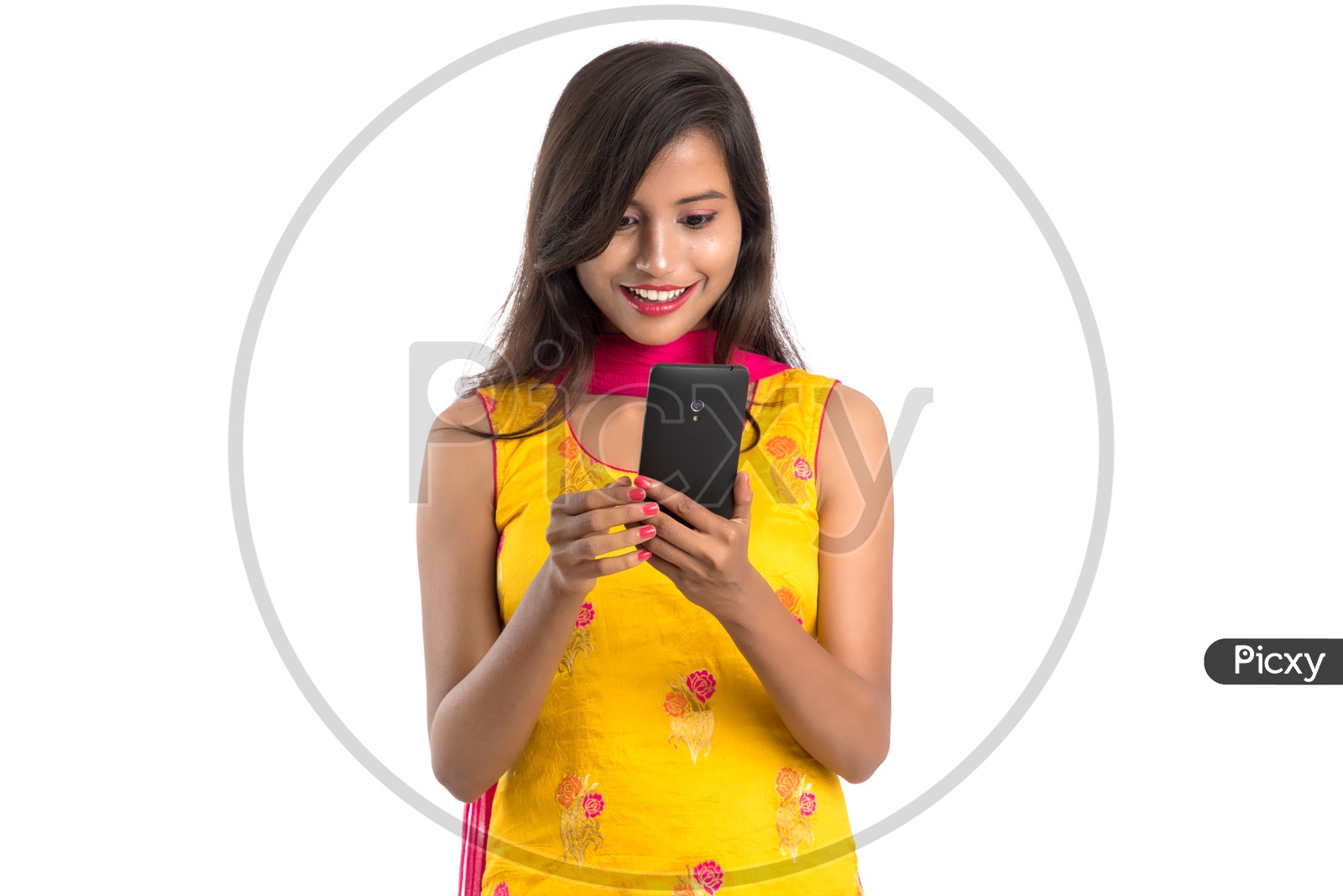 Beautiful Indian Girl Looking at a Smart Phone With an Expression on Face